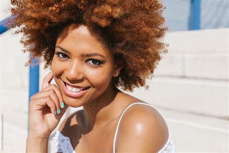 Latin American Afro Woman In A Radiant Summer Day By Victor Torres