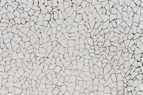 White Broken Tiles Wall — Stock Photo © Homydesign 119828780