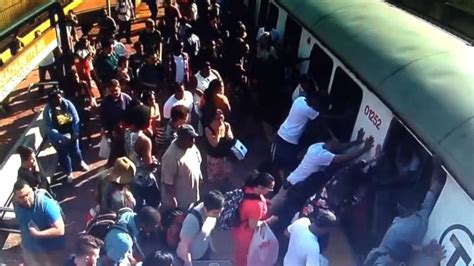 video passengers rescue woman trapped by train abc news