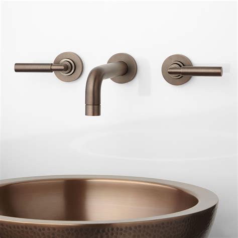 Wall mount faucets tend to pretty expensive because they require a lot of plumbing work. Triton Wall-Mount Bathroom Faucet - Lever Handles - Bathroom