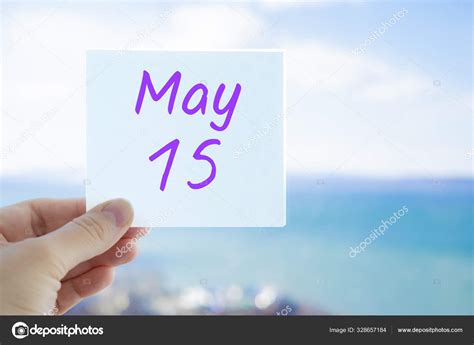 May 15th Hand Holding Sticker With Text May 15 On The Blurred