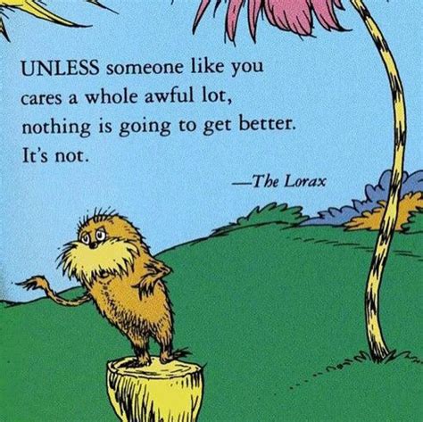 The Lorax Is Sitting On Top Of A Tree Stump And Looking Up At It