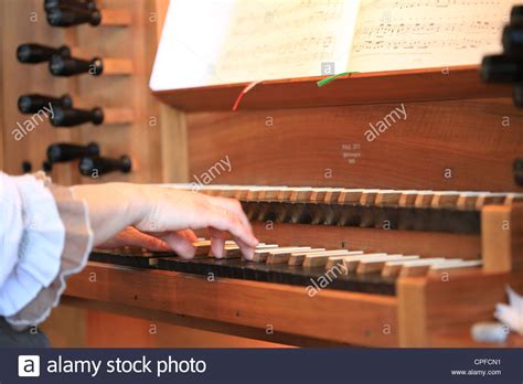 Close Up Of Pipe Organ Playing During An Evangelical Church Service