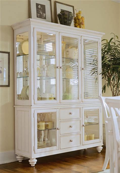It stores all of her cleaning supplies and laundry related items. Little less glass=love | White china cabinets, Dining room ...