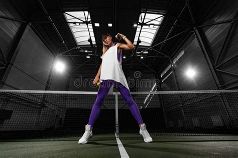Woman Tennis Player Posing Like A Fitness Fashion Model On Tennis Court