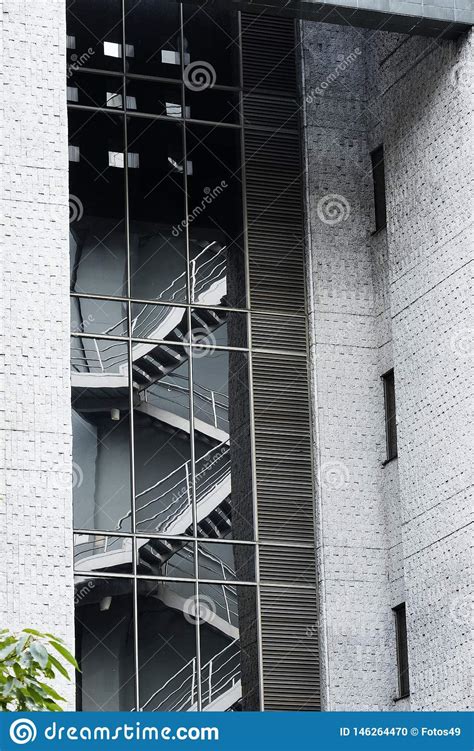 Reflection Of Emergency Stairs In The Glass Of A Modern