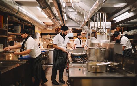 Restaurant Kitchen Crew In Action Stock Photo Download Image Now