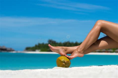 Beautiful Female Legs In The Tropical Beach Conceptual Image Of Stock