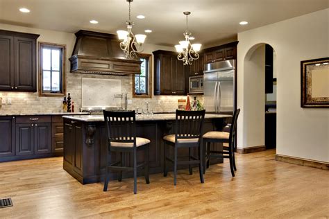 Cream cabinetry captures the essence of a kitchen, creating a buttery, soft ambiance. 46 Kitchens With Dark Cabinets (Black Kitchen Pictures)
