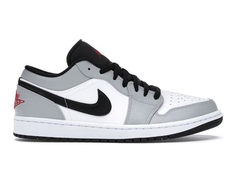 The air jordan 1 low light smoke grey features a white leather upper, overlaid with grey at the heel and toe. Nike Jordan 1 Low Light Smoke Grey | NiceFeet