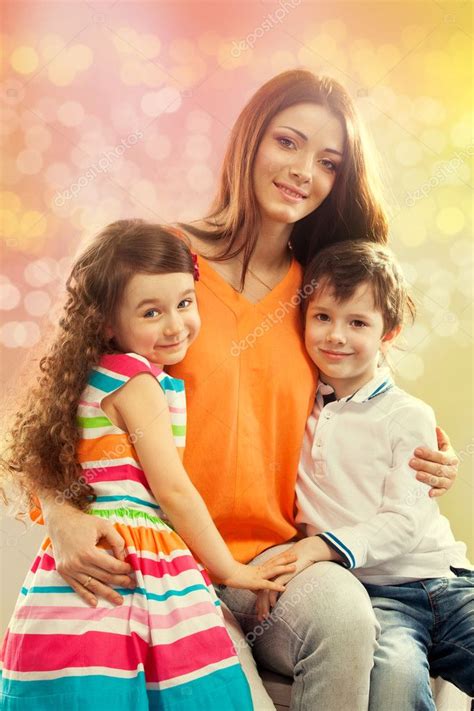 Happy Mother With Her Daughter And Son — Stock Photo © Svetaorlova