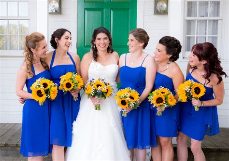 Princess eugenie's wedding dress was designed by peter pilotto and christopher de vos and featured a neckline that folded around the shoulders, a low. Bridesmaids in Royal Blue Cocktail Dresses with Sunflower ...