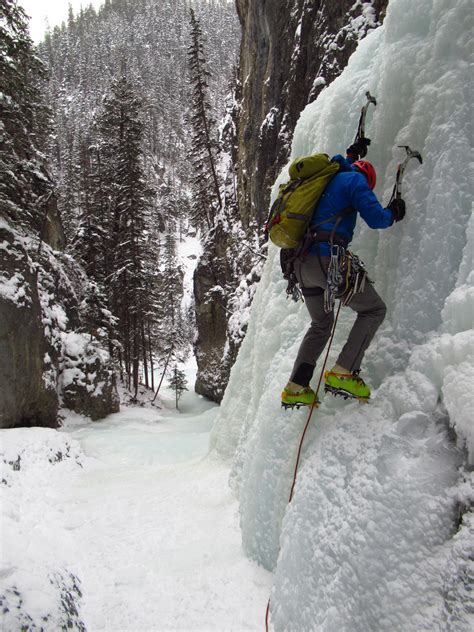 Ice Climbing A Frozen Waterfall For An Ftf Extreme Geocaching At Its
