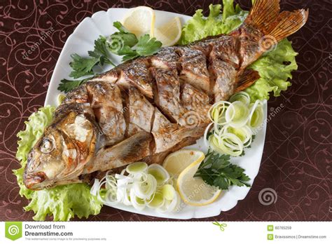 That's the christmas dinner thing for polish catholics. Roasted Carp Fish With Vegetables Entirely. Traditional ...