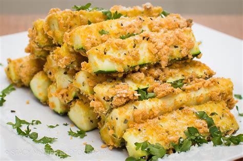Two of the staples of italian cuisine, zucchini and parmesan cheese, team up for a recipe that's easy to make and impressive to serve. Baked Cheddar and Parmesan Zucchini Sticks - Fancy Shanty®