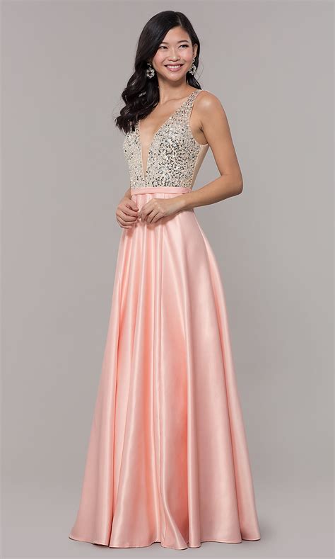 This gorgeous take on sequin dresses will get you from the office christmas party to the club without any issue. Satin V-Neck Long Prom Dress with Sequins - PromGirl