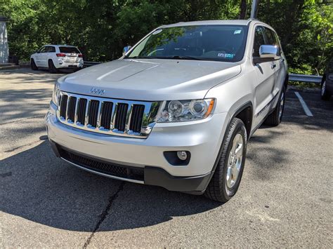 Pre Owned 2012 Jeep Grand Cherokee Limited In Bright Silver Metallic