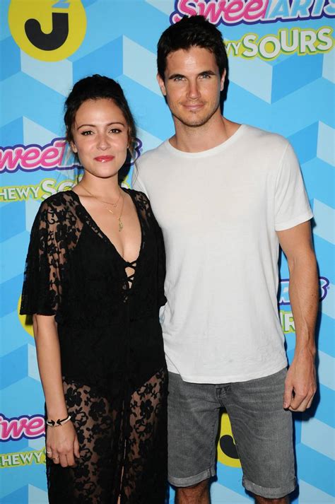 Italia Ricci And Robbie Amell At Just Jared Summer Bash Pool Party