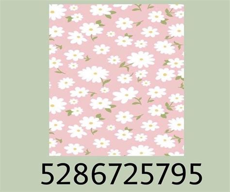 A Pink Background With White Flowers On It And The Number Five In Front