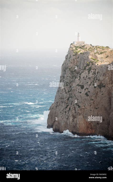 Lighthouse And Cliff Rock At Cap De Formentor In Mallorca Spain Stock