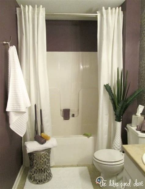 This polyester shower curtain beats vinyl hands down. Hang a second shower curtain to make your tub seem extra ...