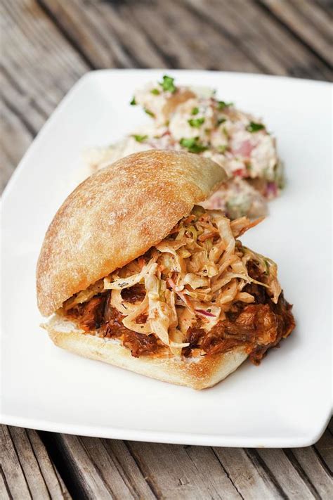 Barbecue Pulled Pork Sandwiches With A Side Of Coleslaw Photograph By