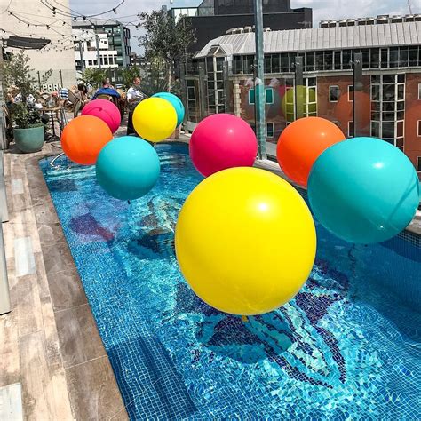 The Curtain Pool Balloons Pool Party Wedding Pool Party Pool Party Balloons