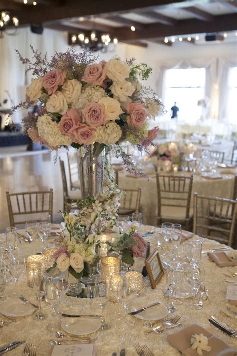 Ivory Roses And Feathers Centerpiece