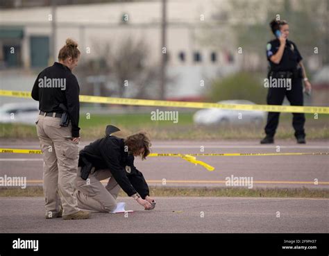 Two Bca Agents Investigate The Scene Of An Officer Involved Shooting In