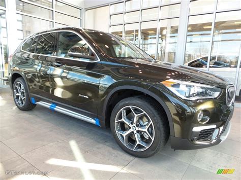 Used 2019 bmw x1 xdrive28i with awd, navigation system, keyless entry, fog lights, spoiler, roof rails, power liftgate, 18 inch wheels, heated mirrors, seat memory, and. 2017 Dark Olive Metallic BMW X1 xDrive28i #118094858 Photo #3 | GTCarLot.com - Car Color Galleries
