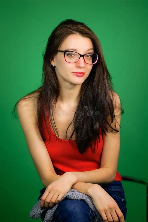 Attractive Smiling Brunette Girl Wearing Optical Eyeglasses Posing In