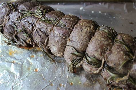 Slice tenderloin in half crosswise to create 2 smaller roasts. Slow-Roasted Beef Tenderloin with Rosemary | Domesticate Me