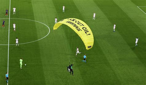 Goodbye france and your pathetic, cheating doping coach in juve. A Greenpeace activist lands on the pitch before the start ...