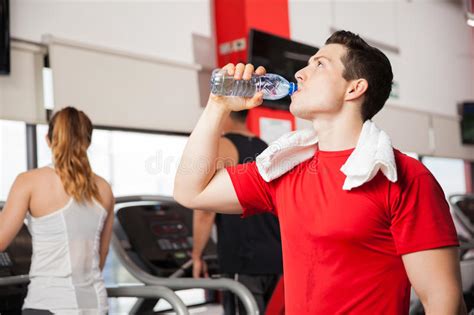 Man Drinking Some Water In A Gym Stock Image Image Of Cooling