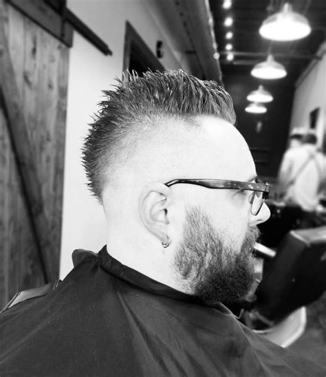 Short hair looks excellent with a beard because it gives a really manly look. 15 Impressive And Bold Mohawk Haircuts For Men - Styleoholic