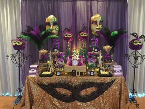 birthday masquerade party candy buffet in purple green black and gold decorações de festas