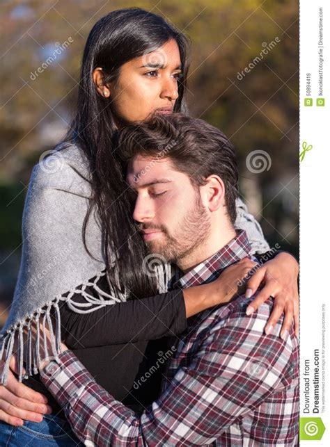 Couple In Love Hugging And Kissing Outside Stock Image Image Of