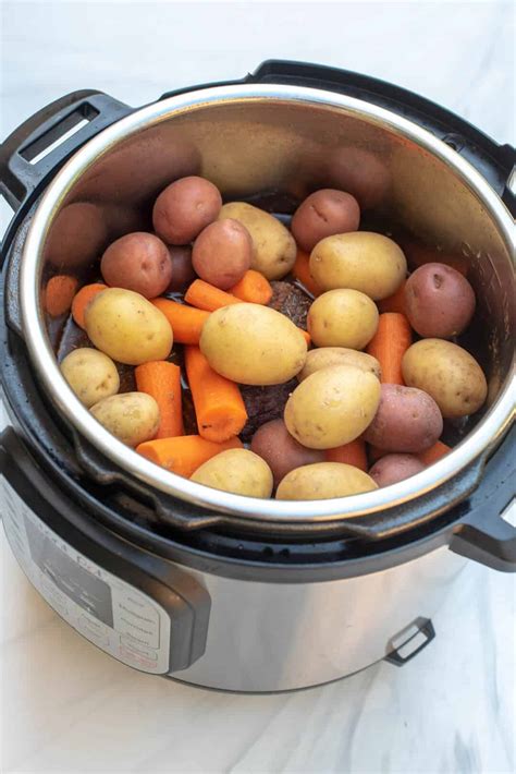 Put the lid on, make sure the steam release valve is set to sealing, and cook on high pressure for 5 minutes. Instant Pot Pot Roast with Carrots and Potatoes | Valerie ...