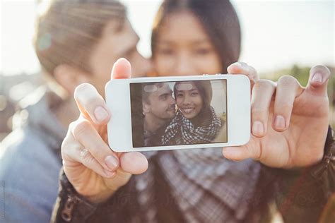 Couple Making A Selfie By Stocksy Contributor Lumina Stocksy