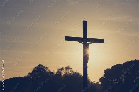 Jesus Christ On The Cross Silhouette At Sunset Crucifixion On The