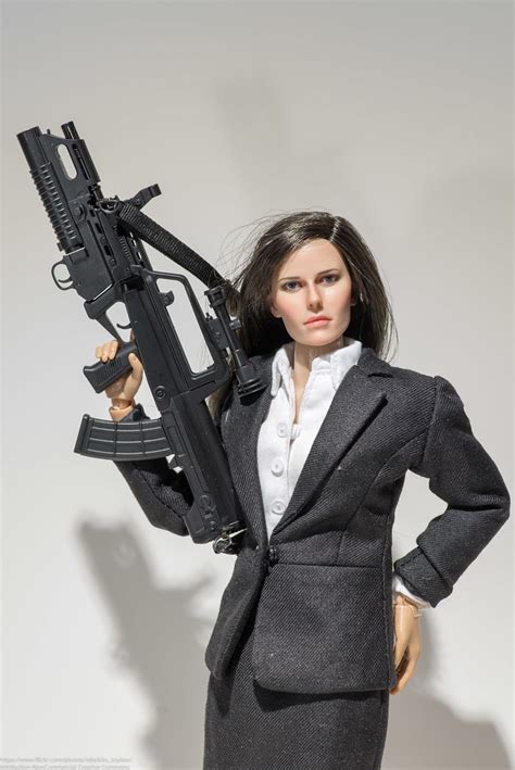 Play Toys Female Agent In Zy Toys Suit With Dam Toys Rifle A Photo On