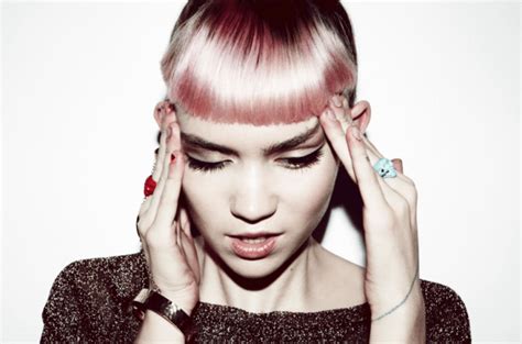 Grimes Says Multiple Male Producers Have Tried To Blackmail Her Into