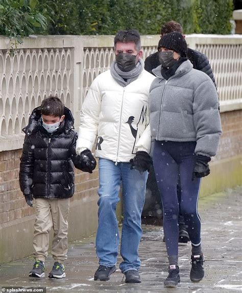 pic exc simon cowell enjoys a walk with partner lauren silverman and son eric daily mail online