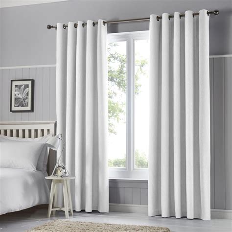 These curtains are often used to block out light from the sun, which can affect your sleep quality. Tyla White Blackout Eyelet Curtains | White curtains ...