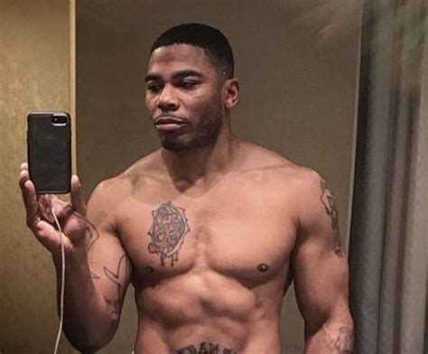 R B Rapper Nelly Shows Off Incredible Physique In Shirtless Bathroom