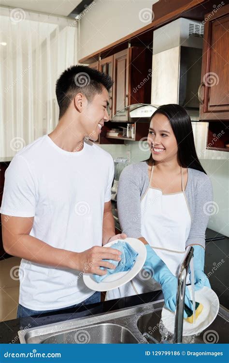 Couple Washing Dishes Stock Photo Image Of Mixedrace 129799186