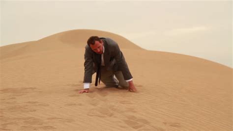 Exhausted Businessman Crawling Desert Stock Footage Video 100 Royalty