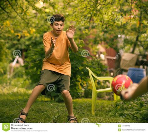 Teenager Boy With Ball Close Up Photo Playing Football Stock Photo