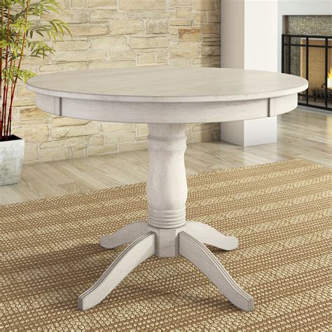 This is particularly apparent if the area is distinctly elongated and the table is especially large, because the. Lexington 42" Round Wood Pedestal Base Dining Table, White ...