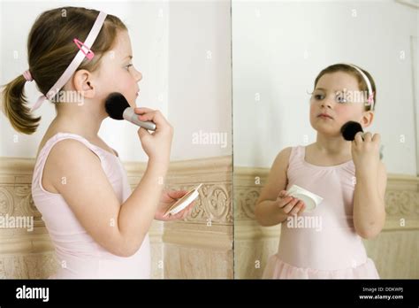 Little Girl Applying Make Up Stock Photo Alamy